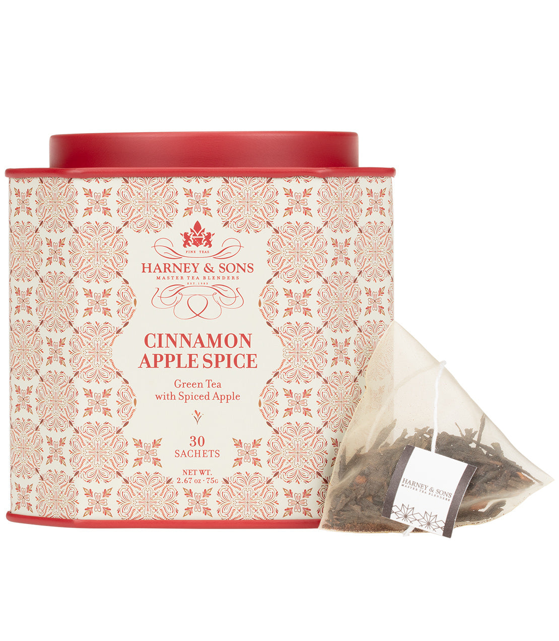 Harney & Sons Cinnamon Apple Spice tea tin with 30 sachets, featuring a decorative design and a sachet of tea.