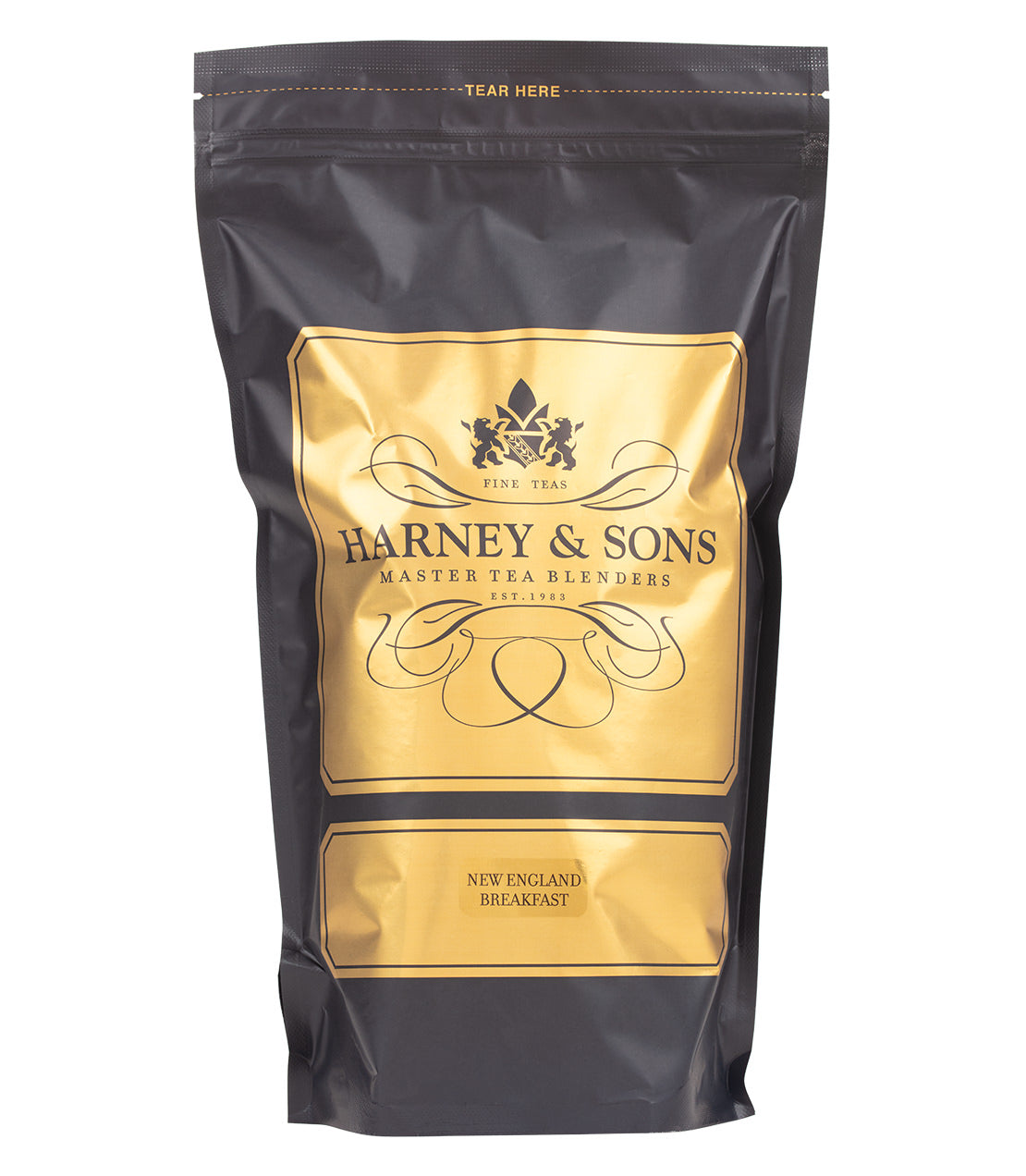 Black tea packaging for Harney & Sons New England Breakfast, featuring a gold and black design.
