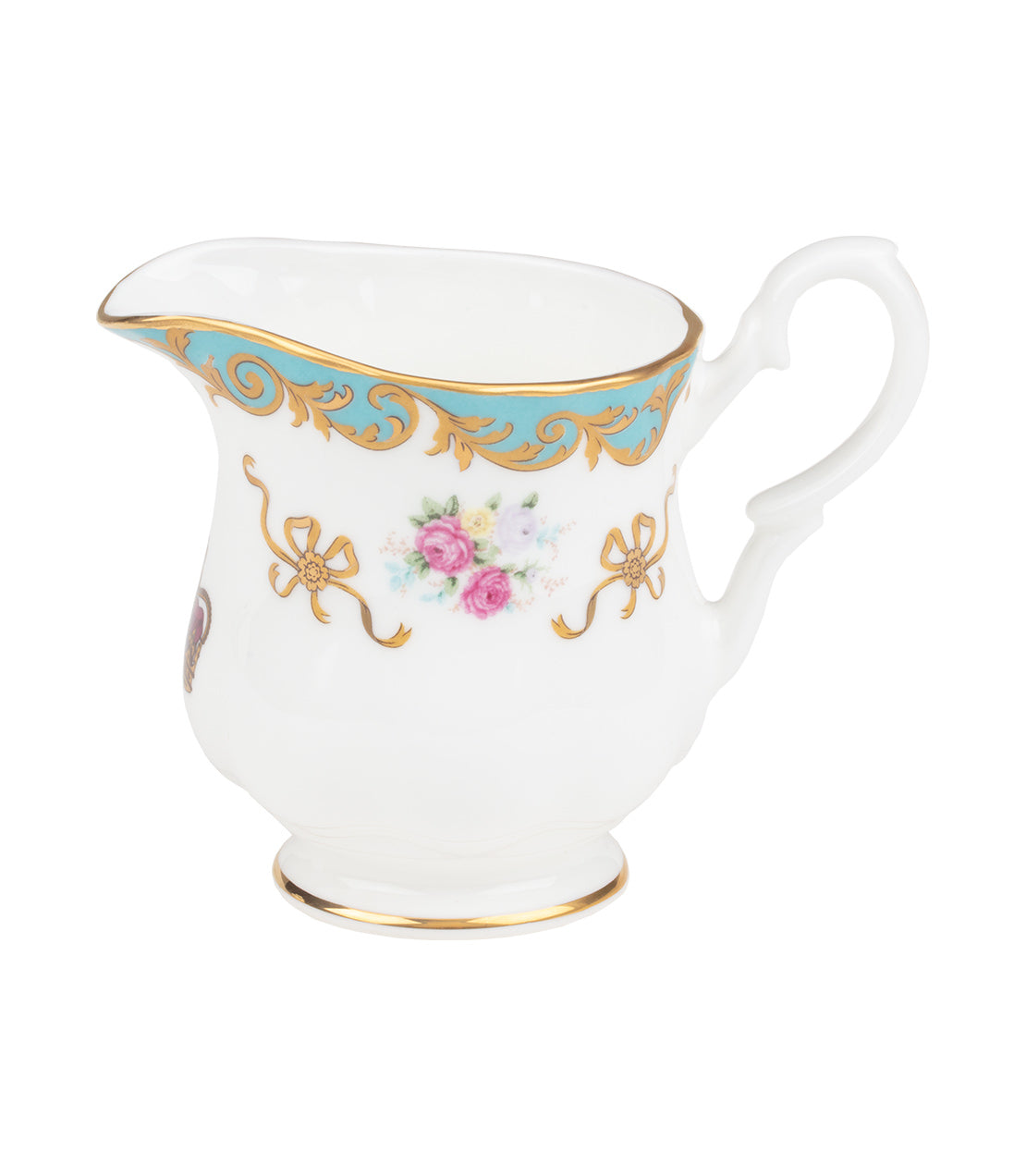 Elegant Historic Royal Palaces tea set creamer with floral design and gold accents on a white porcelain base.