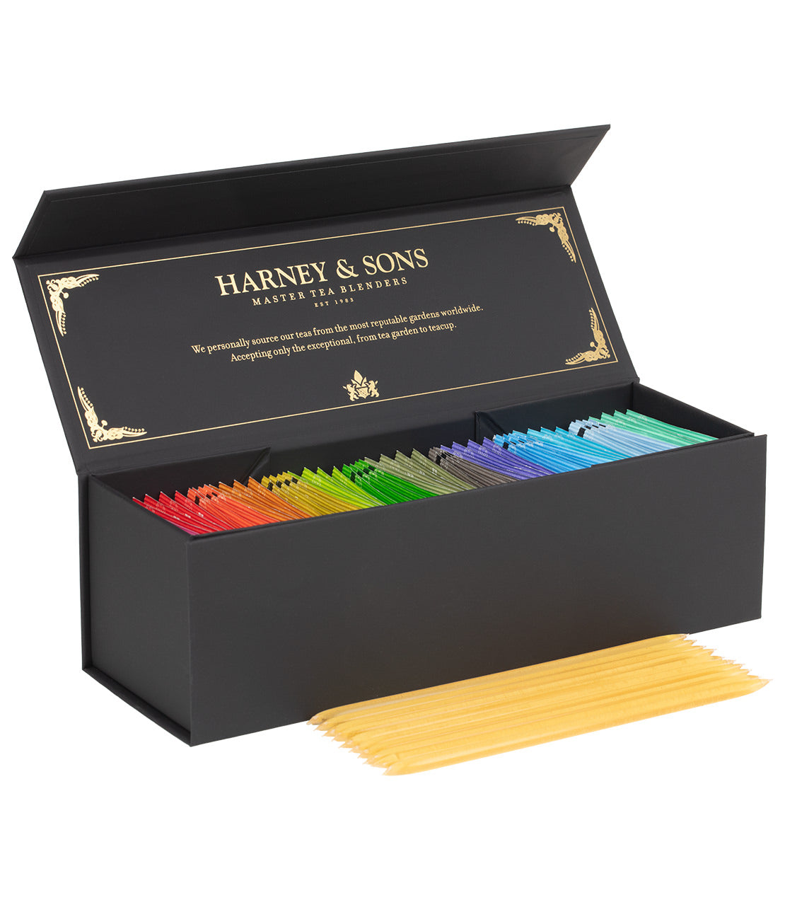 Harney & Sons Fine Teas- Teabag & Honey Sampler- 56 teabags of multiple colors in a black box with gold text and trim- 10 sticks of honey pictured in front of box