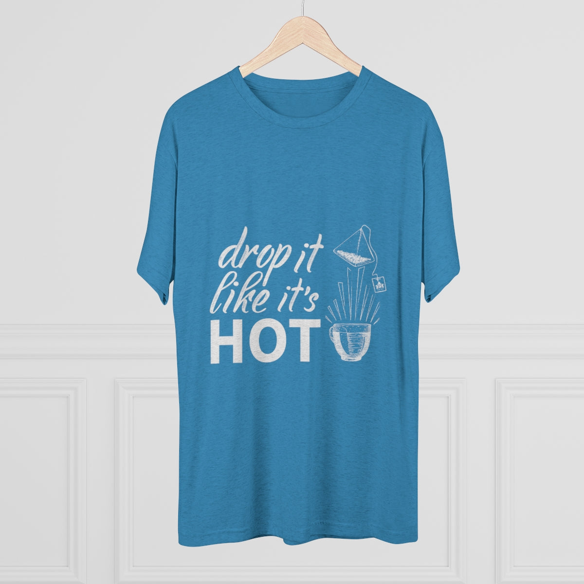 Blue graphic tee featuring the phrase "drop it like it's HOT" with a playful design of a bowl and a strainer.